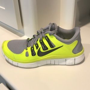 Nike Free 5.0 neon yellow and gray shoe. Size 5.